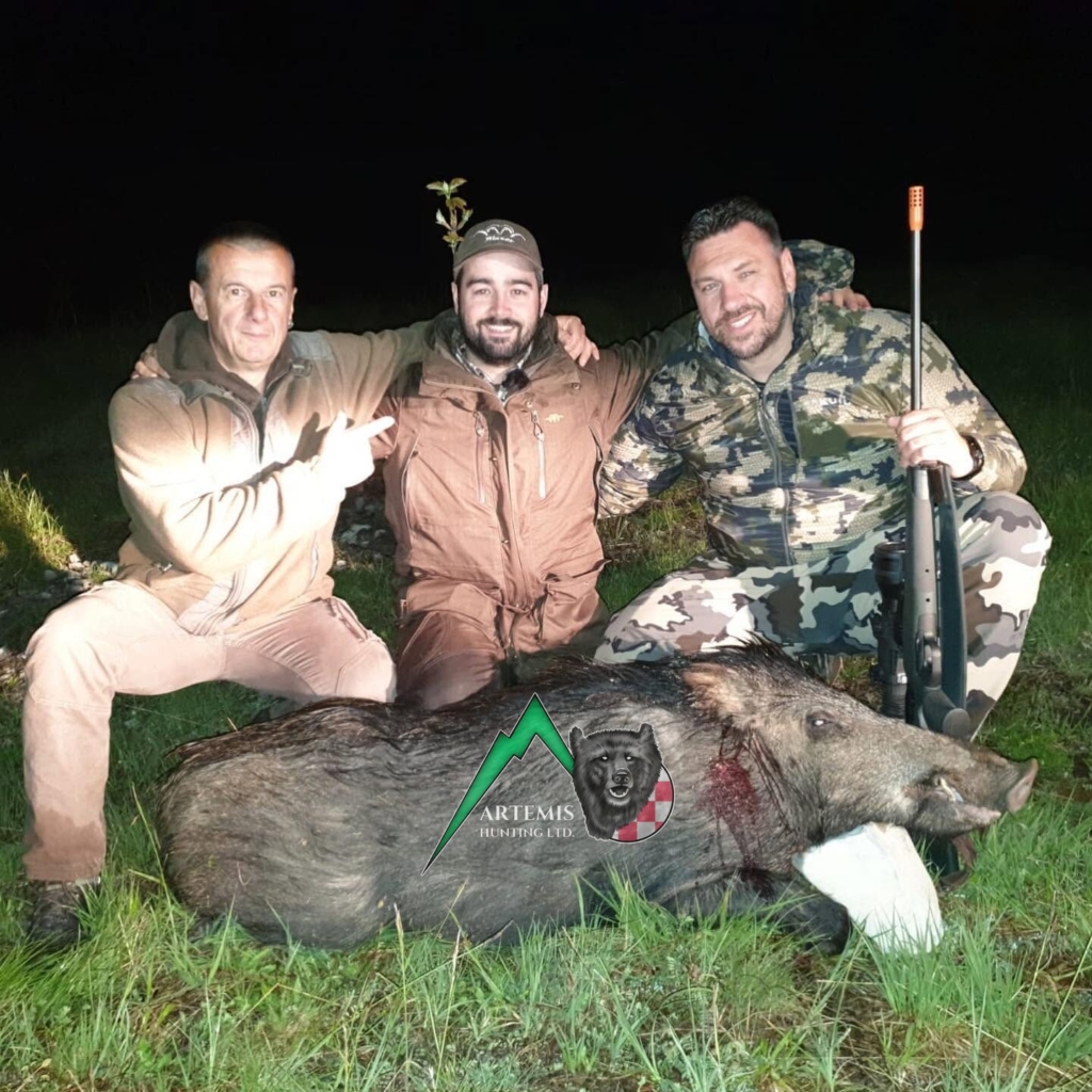 Tomo Svetic (owner of Artemis Hunting) with a client of Artemis Hunting on a successful wild boar hunt in Croatia