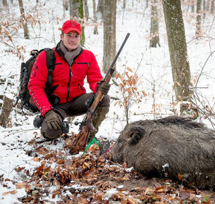 Franz Albrecht, client of Artemis Hunting with his harvested wild boar in Croatia